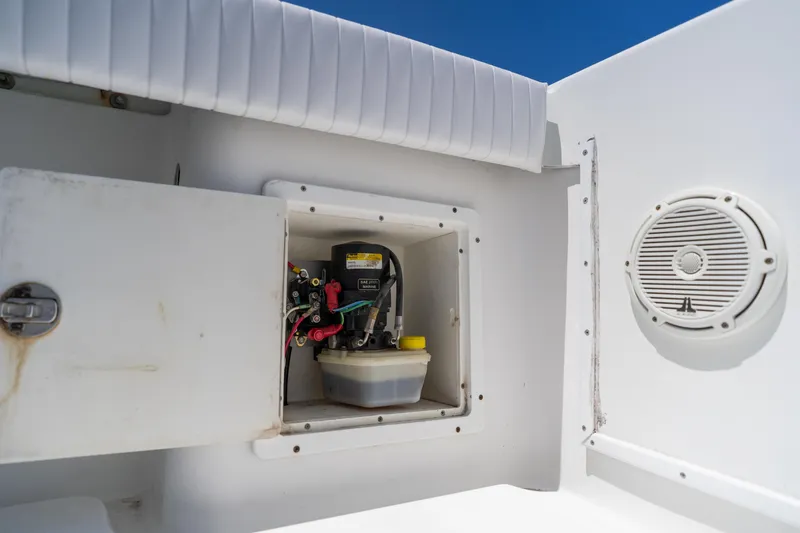Slide: The Image of 2007 Yellowfin 34 Offshore boat compartment with wiring and speaker detail. - 58