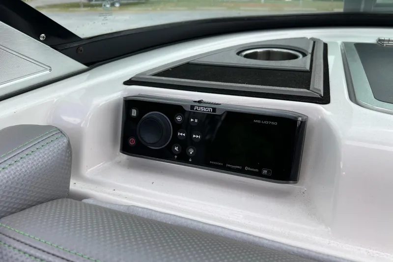 Slide: The Image of 2017 MasterCraft XT23 boat dashboard with Fusion MS-UD750 stereo system. - 6