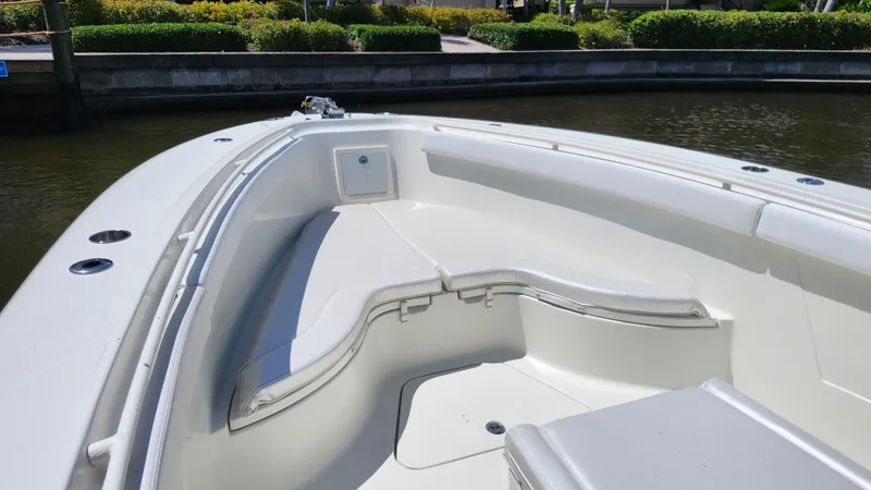 Slide: The Image of 2014 Hydra-Sports 3400 CC boat, bow view by the water. - 10