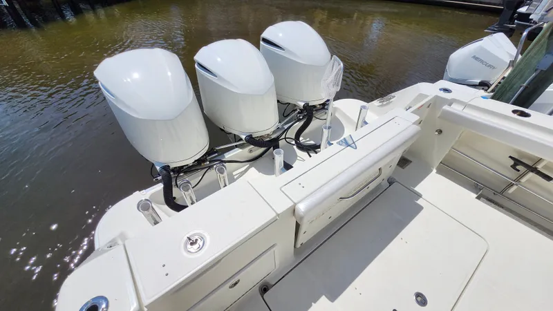 Slide: The Image of 2014 Hydra-Sports 3400 CC with triple outboard engines. - 14