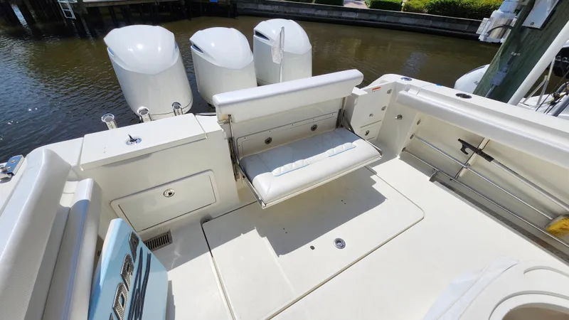 Slide: The Image of 2014 Hydra-Sports 3400 CC boat with bench seat and engines. - 15