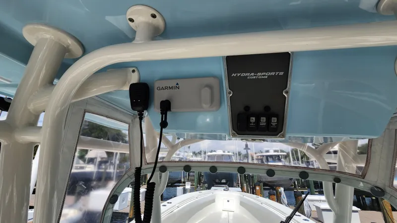 Slide: The Image of Interior view of a 2014 Hydra-Sports 3400 CC boat with Garmin equipment. - 18
