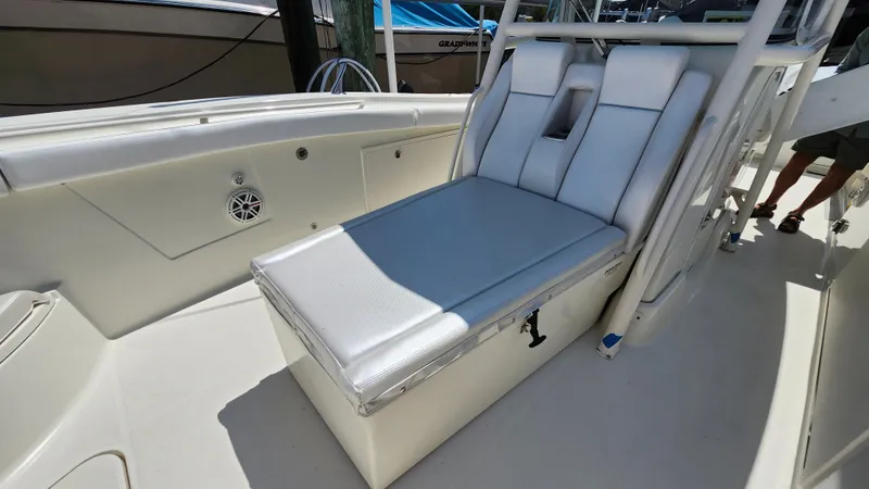 Slide: The Image of 2014 Hydra-Sports 3400 CC boat with cushioned seating area. - 20