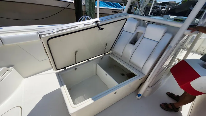 Slide: The Image of 2014 Hydra-Sports 3400 CC boat with open storage compartment. - 21