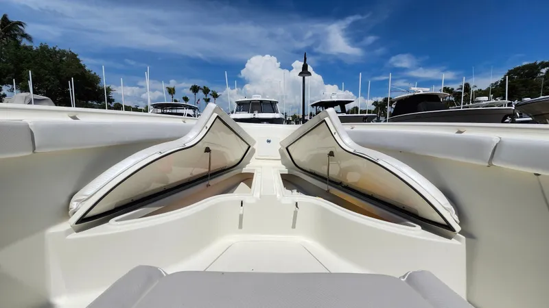 Slide: The Image of 2014 Hydra-Sports 3400 CC boat with open storage, blue sky. - 23
