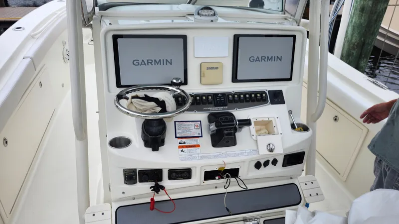 Slide: The Image of 2014 Hydra-Sports 3400 CC boat console with Garmin displays. - 28