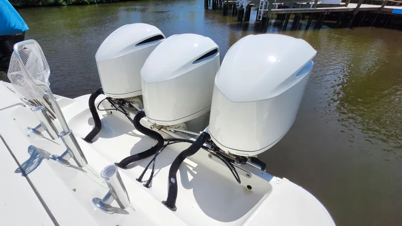 Slide: The Image of Triple engines on a 2014 Hydra-Sports 3400 CC boat. - 29