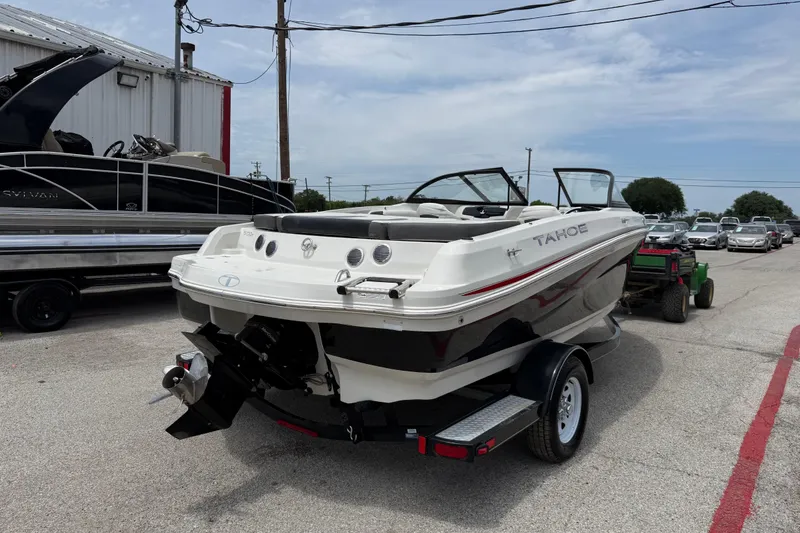 Slide: The Image of 2016 Tahoe 500 TF boat on trailer in outdoor lot, rear view. - 12
