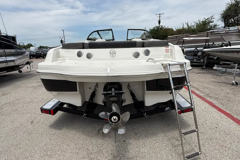 Slide: The Image of Rear view of a 2016 Tahoe 500 TF boat with ladder and propeller. - 2