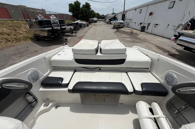 Slide: The Image of Interior of a 2016 Tahoe 500 TF boat with white and black seating. - 30