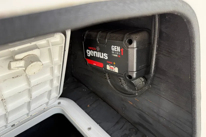 Slide: The Image of NOCO Genius GEN Mini 1 charger inside 2016 Tahoe 500 TF compartment. - 42