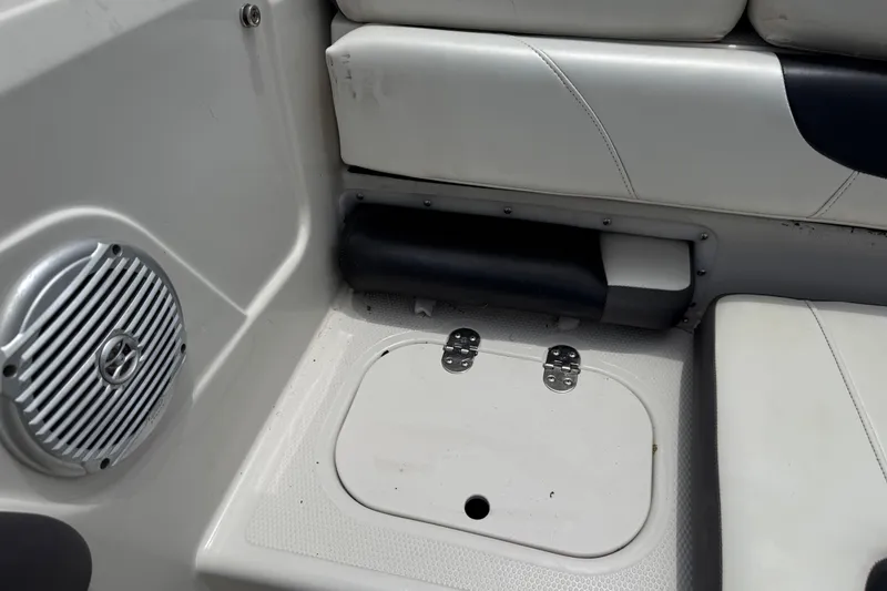 Slide: The Image of Interior of a 2016 Tahoe 500 TF boat showing seating and speaker detail. - 55
