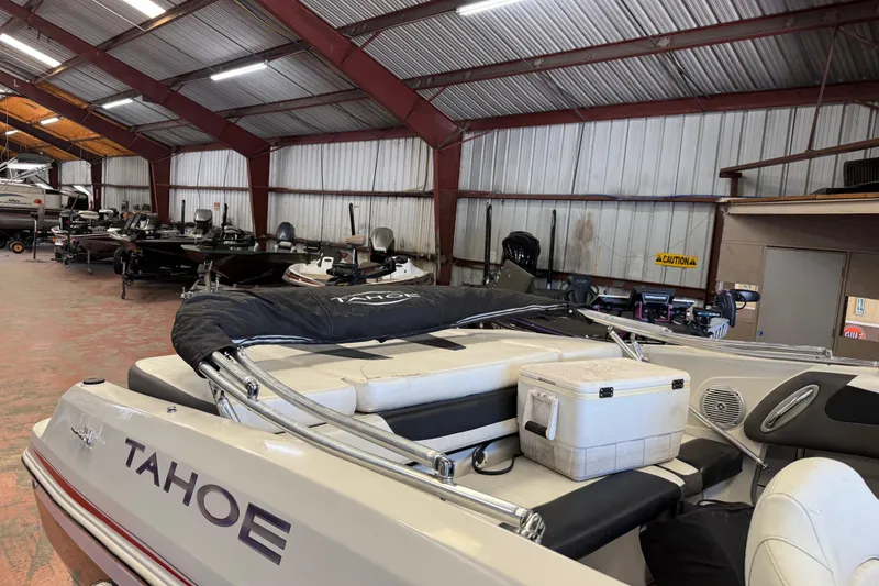 Slide: The Image of 2016 Tahoe 500 TF boat in storage facility with other boats. - 60