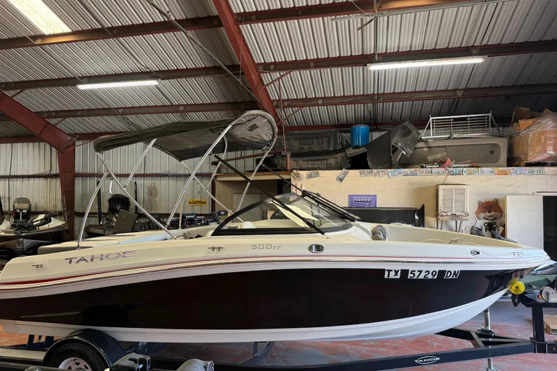 Slide: The Image of 2016 Tahoe 500 TF boat in a storage facility, side view. - 65