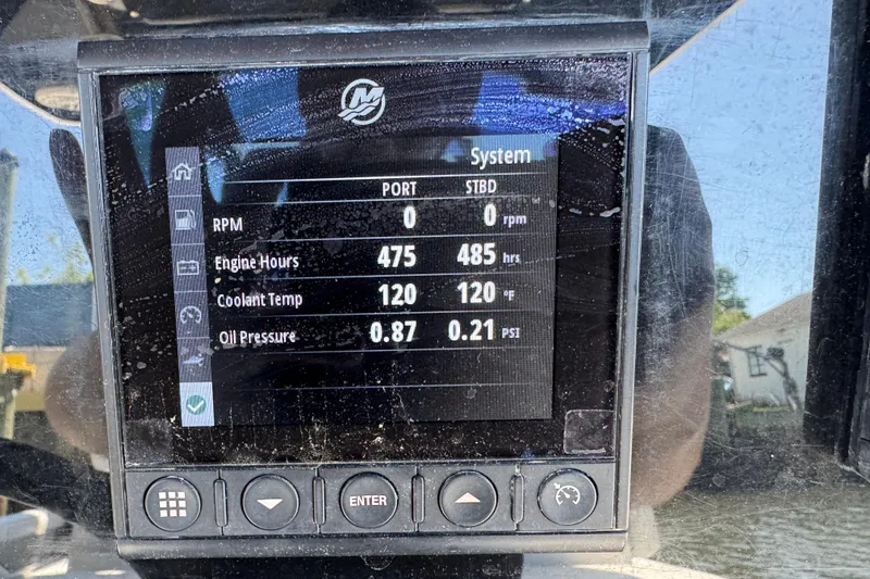 Slide: The Image of Display screen of a 2020 Blackfin 272 CC showing engine metrics and system status. - 10