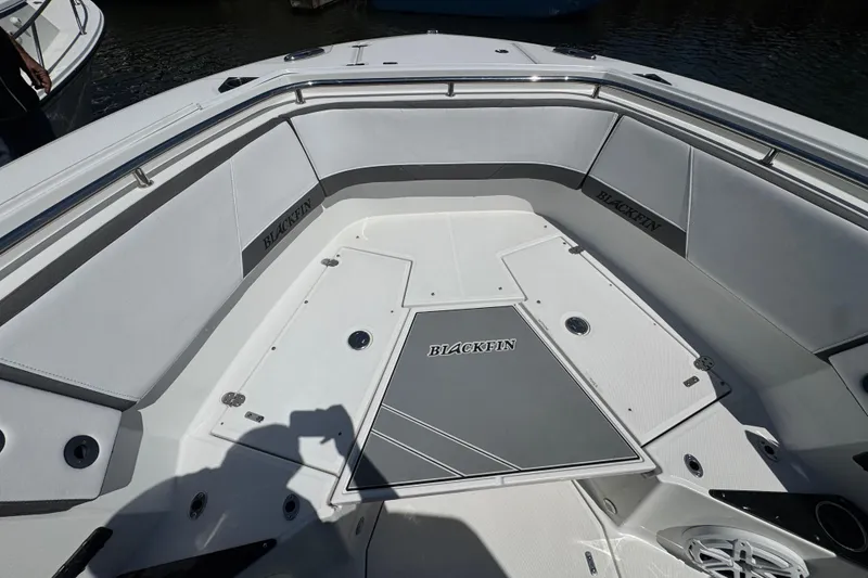 Slide: The Image of 2020 Blackfin 272 CC boat interior with sleek seating and modern design. - 16