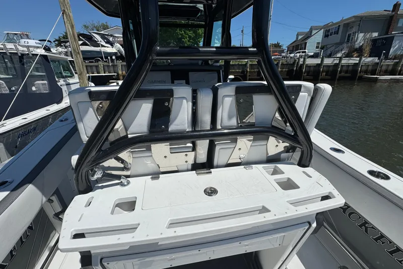 Slide: The Image of 2020 Blackfin 272 CC boat interior with Garmin electronics and fishing station. - 6