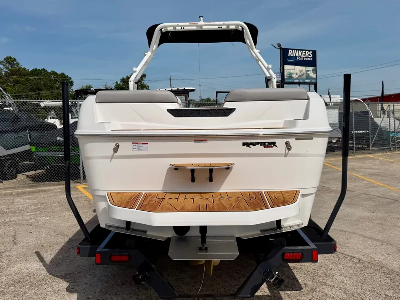 Slide: The Image of Rear view of 2026 Moomba Tykon boat on a trailer. - 4