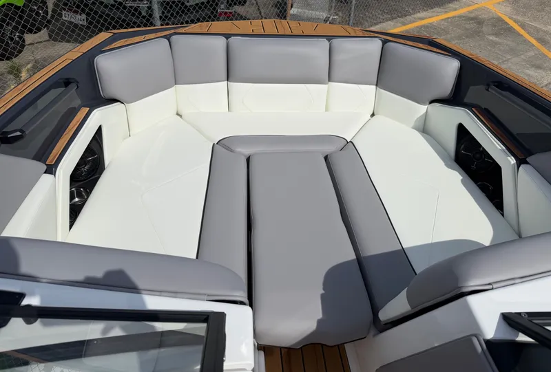 Slide: The Image of Interior of 2026 Moomba Tykon with gray and white upholstery. - 5
