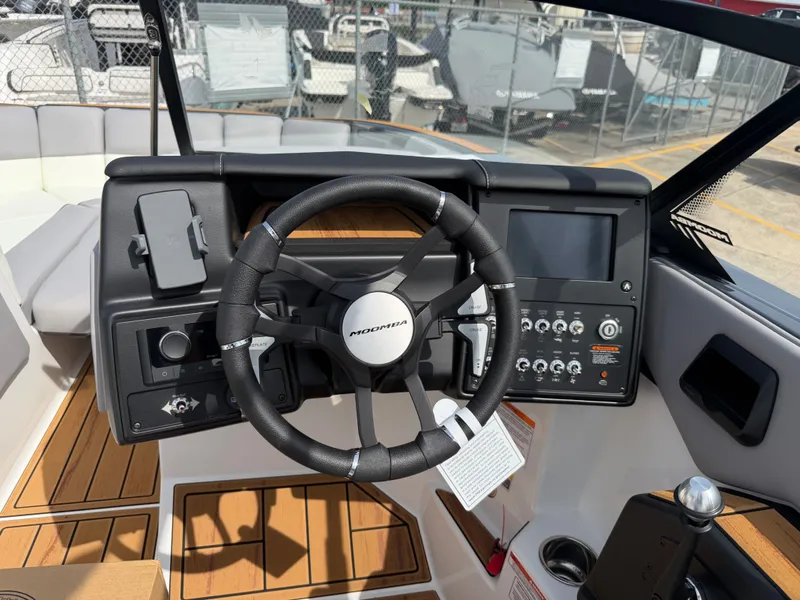 Slide: The Image of Moomba Tykon 2026 steering console with modern dashboard. - 6