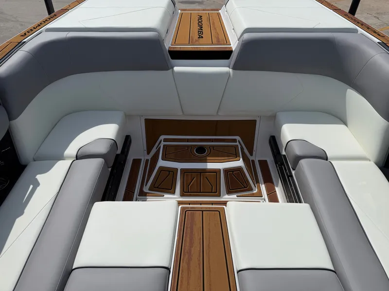 Slide: The Image of Interior of 2026 Moomba Tykon with gray and white seating. - 8