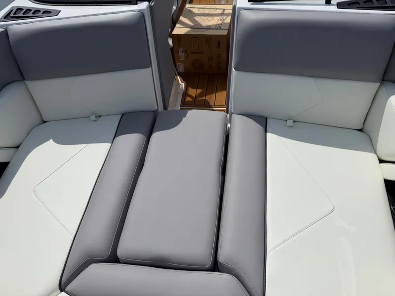 Slide: The Image of Interior of Moomba Tykon 2026 with gray and white seating. - 9