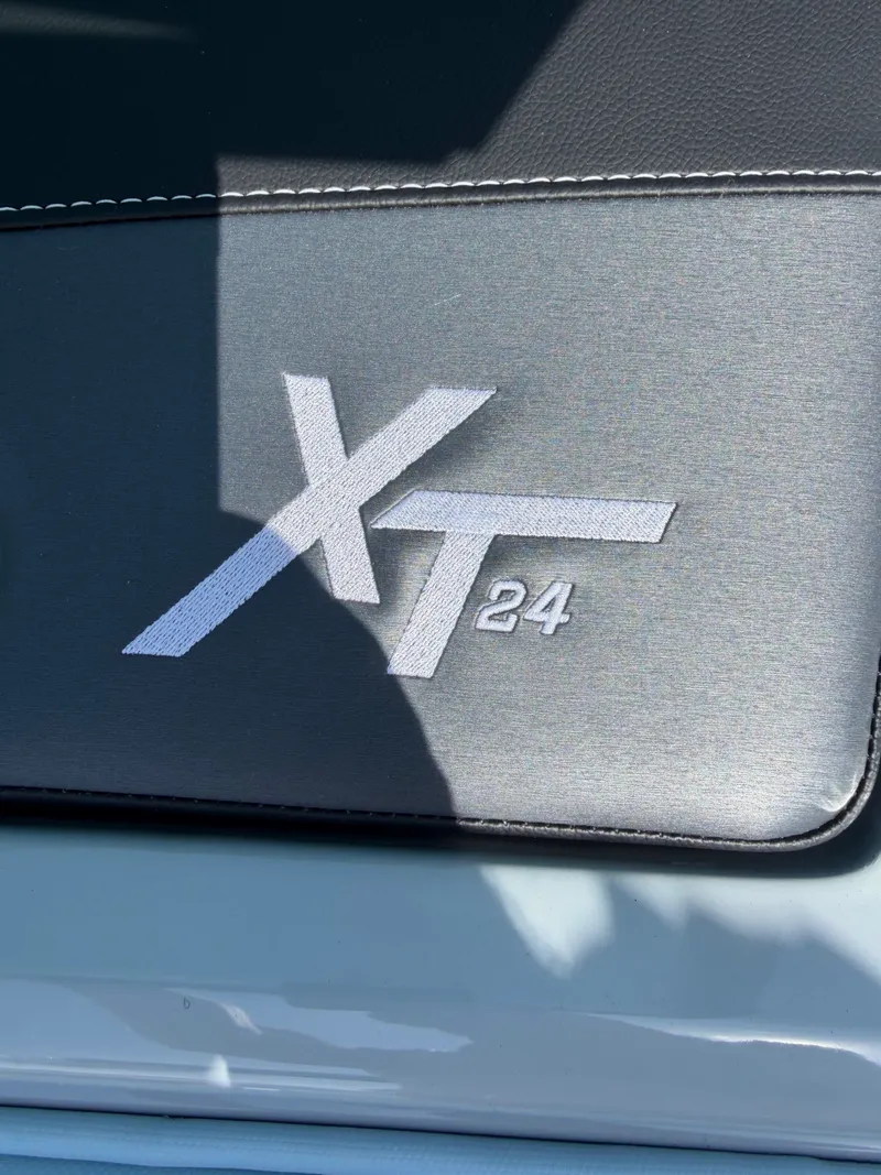 Slide: The Image of MasterCraft XT24 2026 logo on black background. - 12