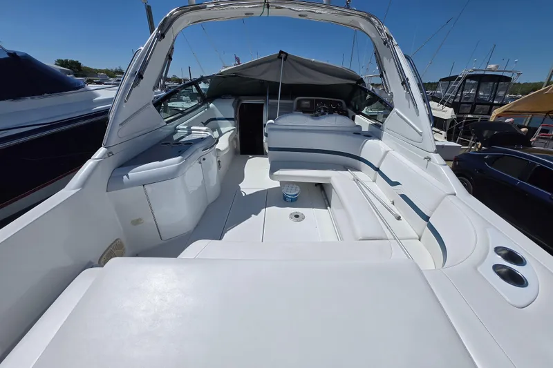 Slide: The Image of 2005 Formula 330 Sun Sport boat interior with spacious seating and sleek design. - 1