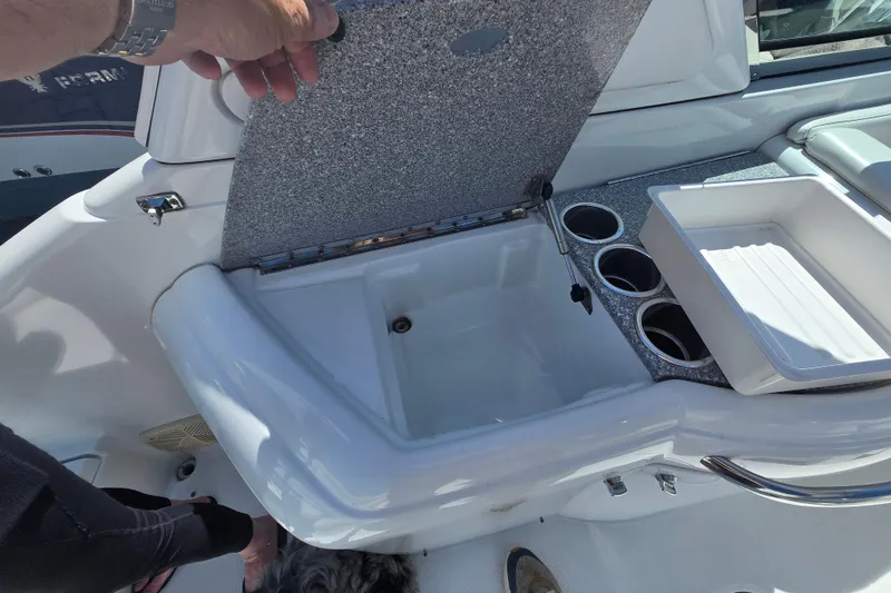Slide: The Image of 2005 Formula 330 Sun Sport boat interior with sink and cup holders. - 19
