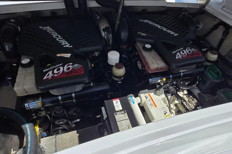 Slide: The Image of Engine compartment of a 2005 Formula 330 Sun Sport with twin MerCruiser 496 MAG engines. - 23