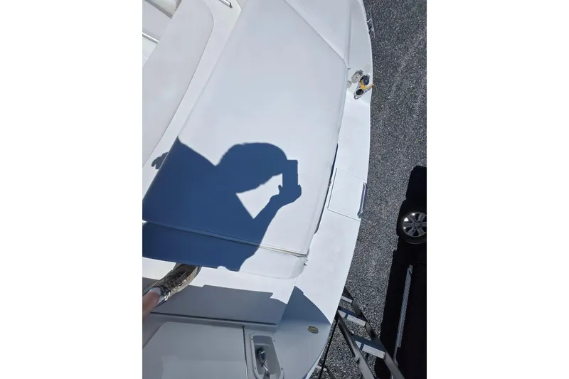 Slide: The Image of Shadow on deck of 2005 Formula 330 Sun Sport boat, with visible car below. - 26