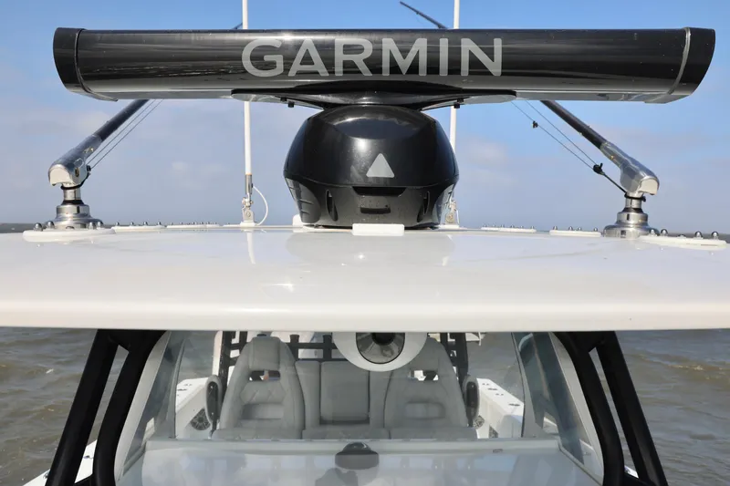 Slide: The Image of 2024 Freeman 38 boat with Garmin radar system on open water. - 24