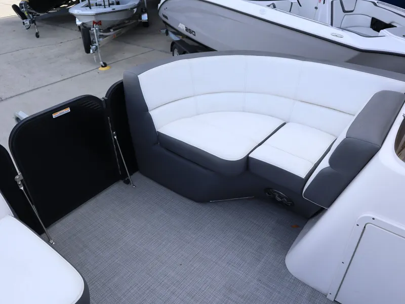 Slide: The Image of Interior of 2022 Manitou AURORA LE 20RF with white seating. - 18