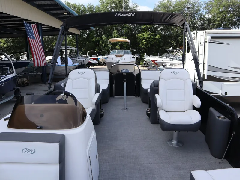 Slide: The Image of 2022 Manitou AURORA LE 20RF pontoon boat with luxurious seating. - 20