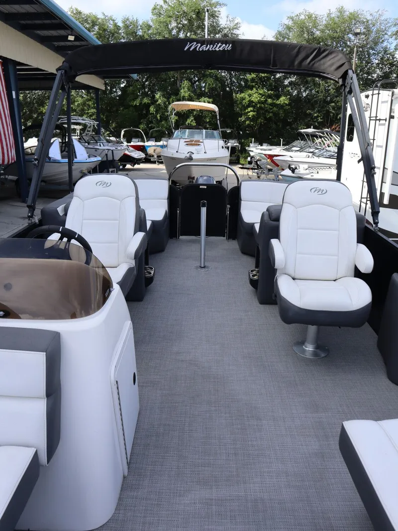 Slide: The Image of Interior view of 2022 Manitou AURORA LE 20RF pontoon boat. - 21
