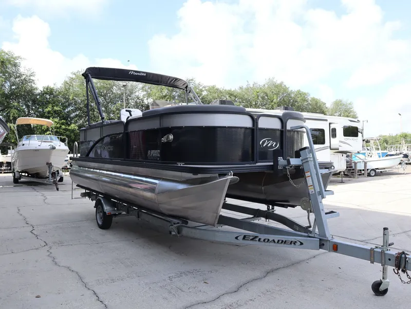 Slide: The Image of 2022 Manitou AURORA LE 20RF pontoon boat on trailer. - 5