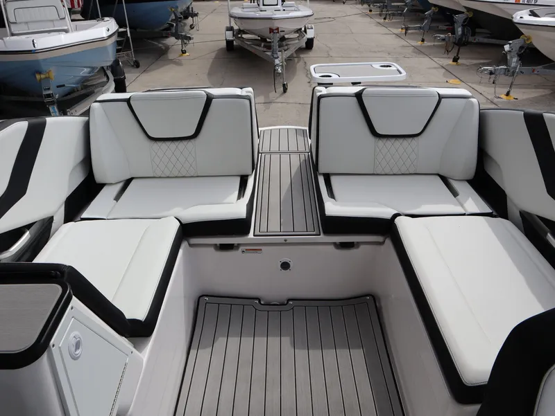 Slide: The Image of Interior of Yamaha Boats 252XE 2026 with luxurious white seating. - 12