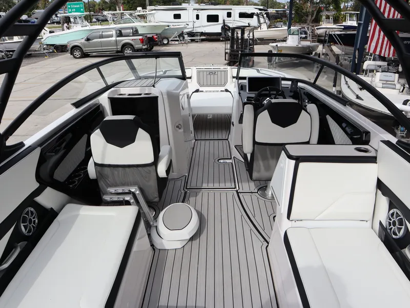 Slide: The Image of Interior of 2026 Yamaha Boats 252XE with modern seating and helm console. - 7