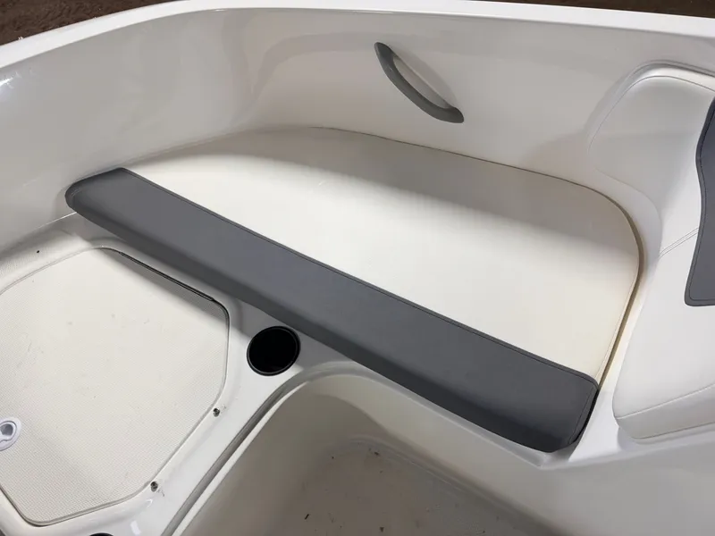 Slide: The Image of Interior of 2018 Bayliner Element E18 boat, seating area. - 14