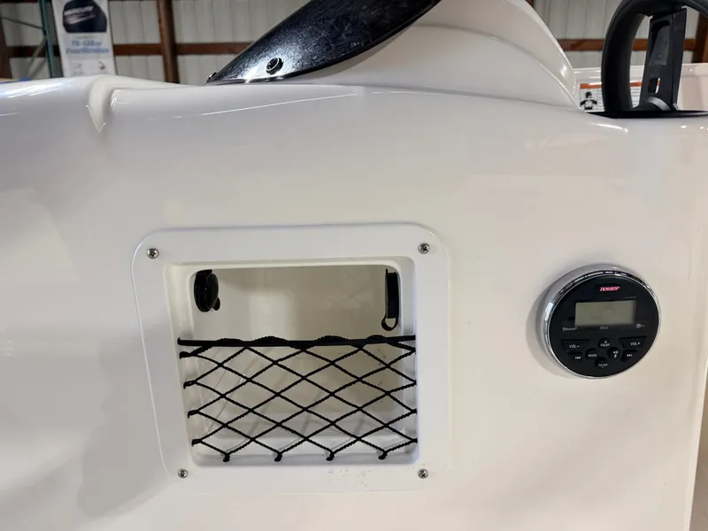 Slide: The Image of Close-up of 2018 Bayliner Element E18 boat with radio. - 20