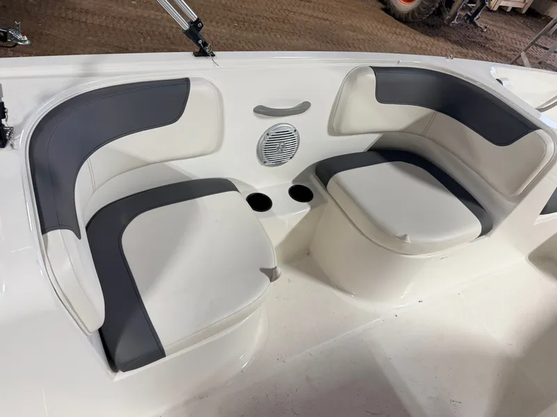 Slide: The Image of Interior of 2018 Bayliner Element E18 boat with gray and white seating. - 28