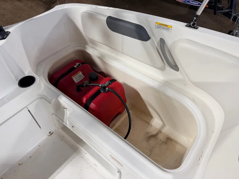 Slide: The Image of 2018 Bayliner Element E18 boat with red fuel tank. - 35