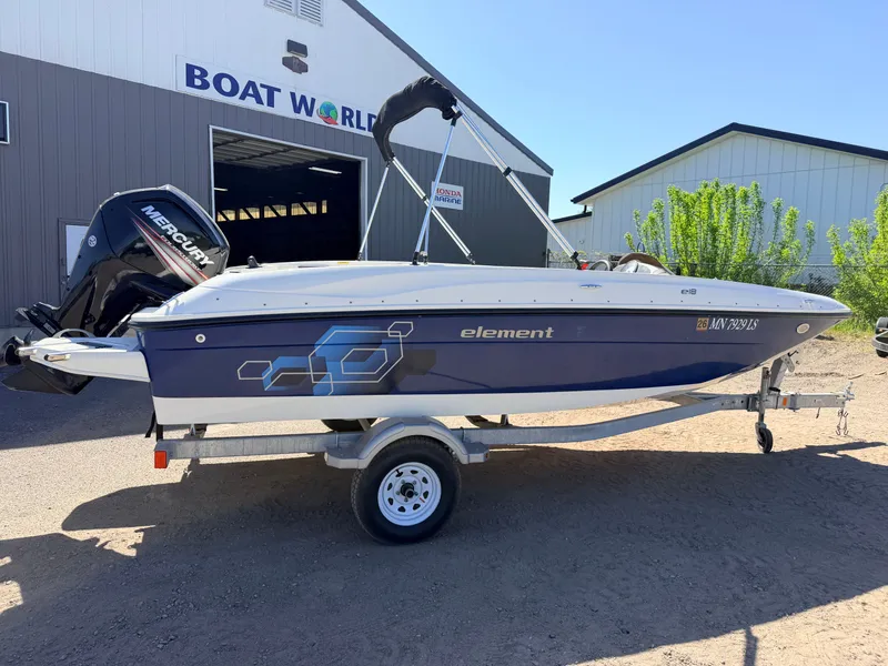 Slide: The Image of 2018 Bayliner Element E18 with 90HP Mercury 4Stroke outside boat workshop. - 39