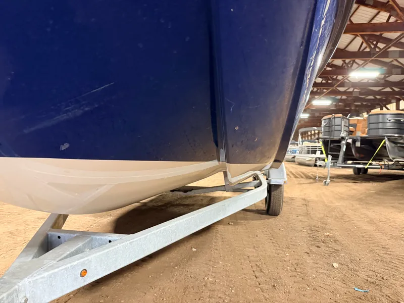 Slide: The Image of Bayliner Element E18 boat on trailer in warehouse, 2018 model. - 44