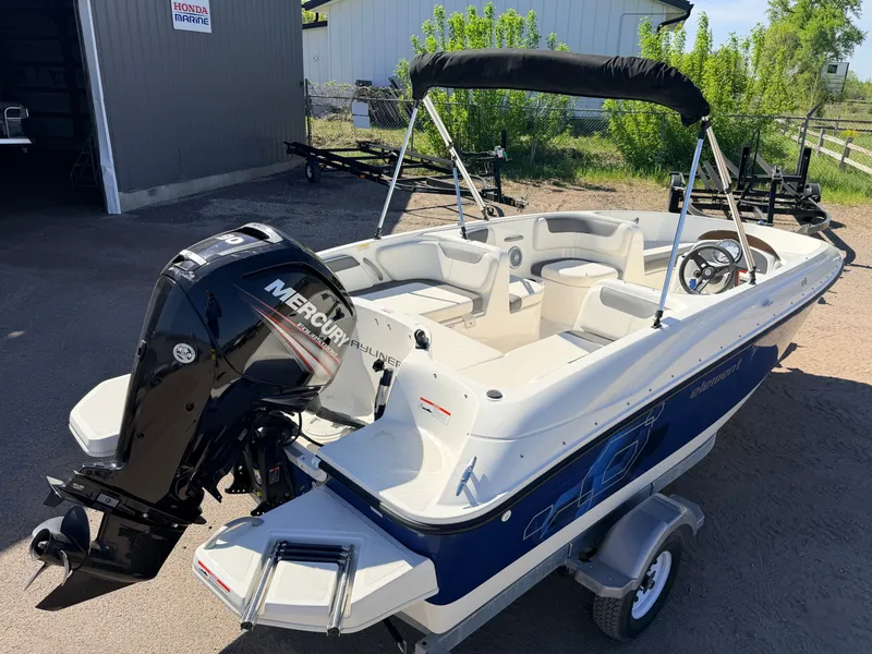 Slide: The Image of 2018 Bayliner Element E18 with 90HP Mercury 4Stroke engine on trailer. - 7