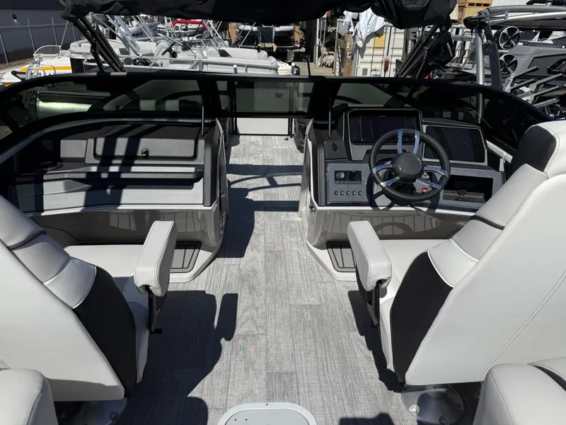 Slide: The Image of Interior of 2026 Avalon Catalina Quad Lounge with helm console. - 8