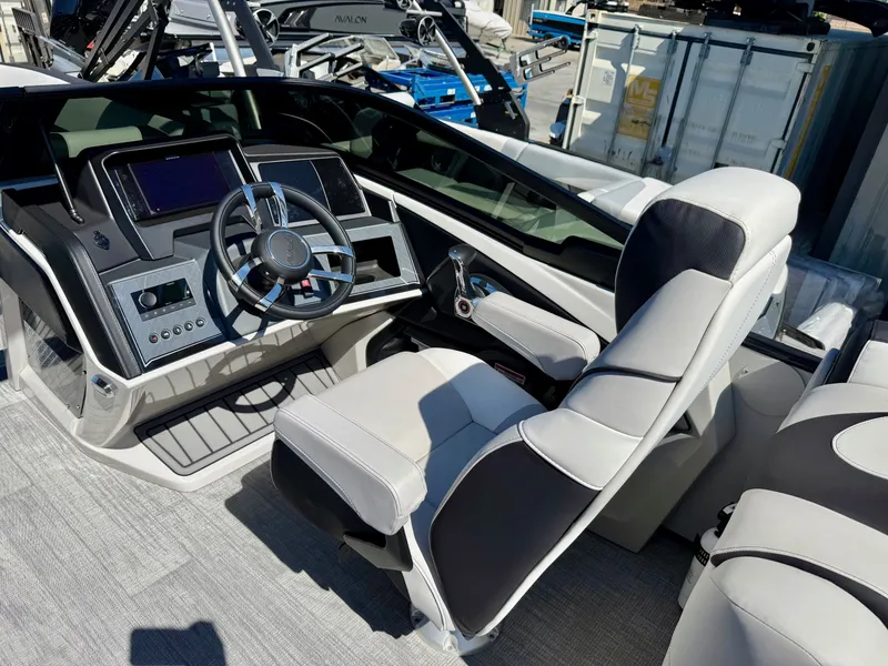 Slide: The Image of Interior of 2026 Avalon Catalina Quad Lounge with helm console. - 9