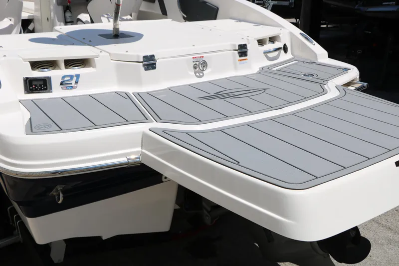 Slide: The Image of 2021 Chaparral 21 SSi Ski & Fish boat with sleek swim platform and modern design. - 11
