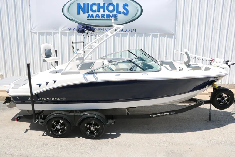 Slide: The Image of 2021 Chaparral 21 SSi Ski & Fish boat on trailer at Nichols Marine dealership. - 12