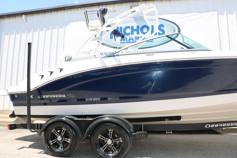 Slide: The Image of 2021 Chaparral 21 SSi Ski & Fish boat on trailer, side view. - 15